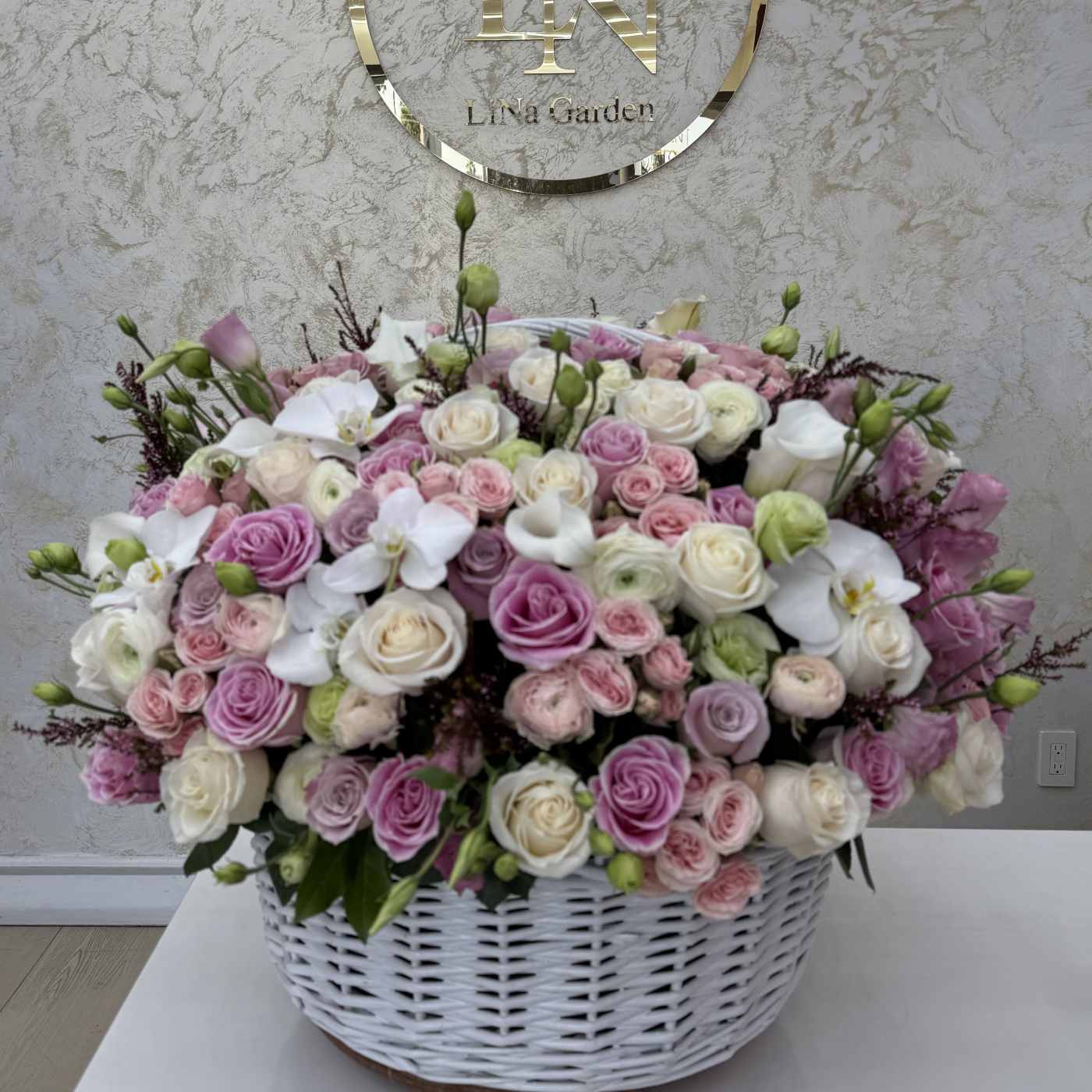 Quiet Comfort luxury flower basket for sympathy and milestone occasions from Lina Flowers