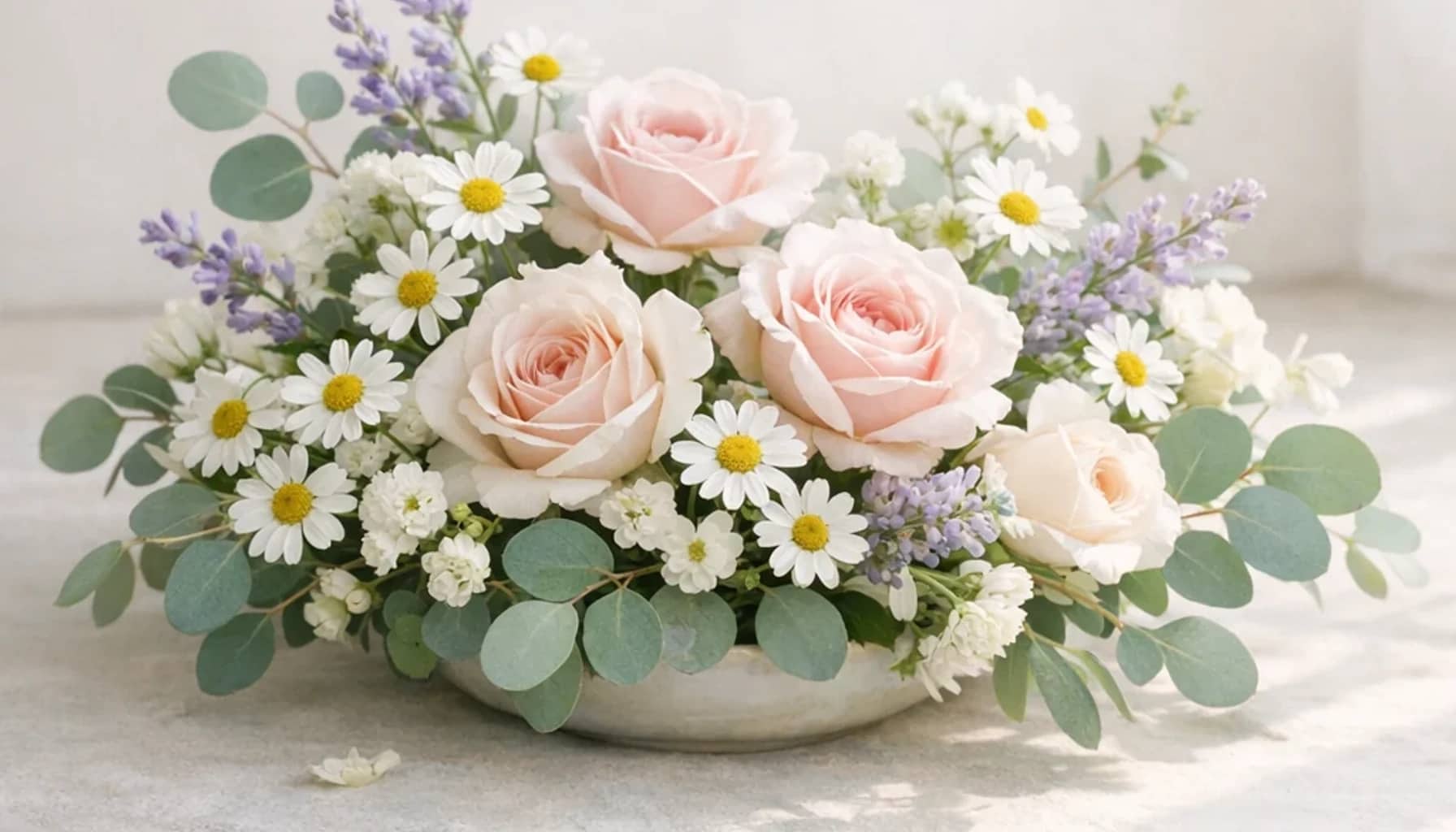International Day of Yoga flower arrangement with chamomile, soft roses, eucalyptus designed as a respectful health and wellbeing floral guide