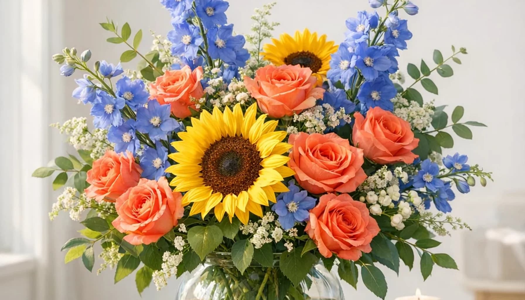 International Human Solidarity Day flower guide banner featuring sunflowers, coral roses, blue delphinium in sun, coral, blue, green tones