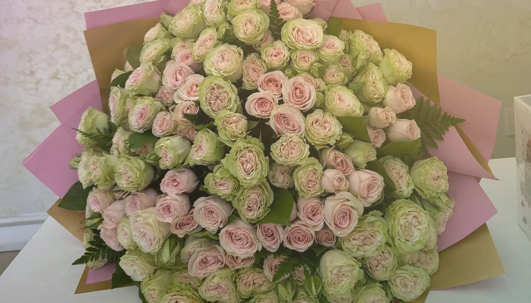 April Fools' Day flowers collection banner with parrot tulips, striped tulips, and ranunculus and playful, unexpected, joyful, and warmly surprising styling from LiNa Garden