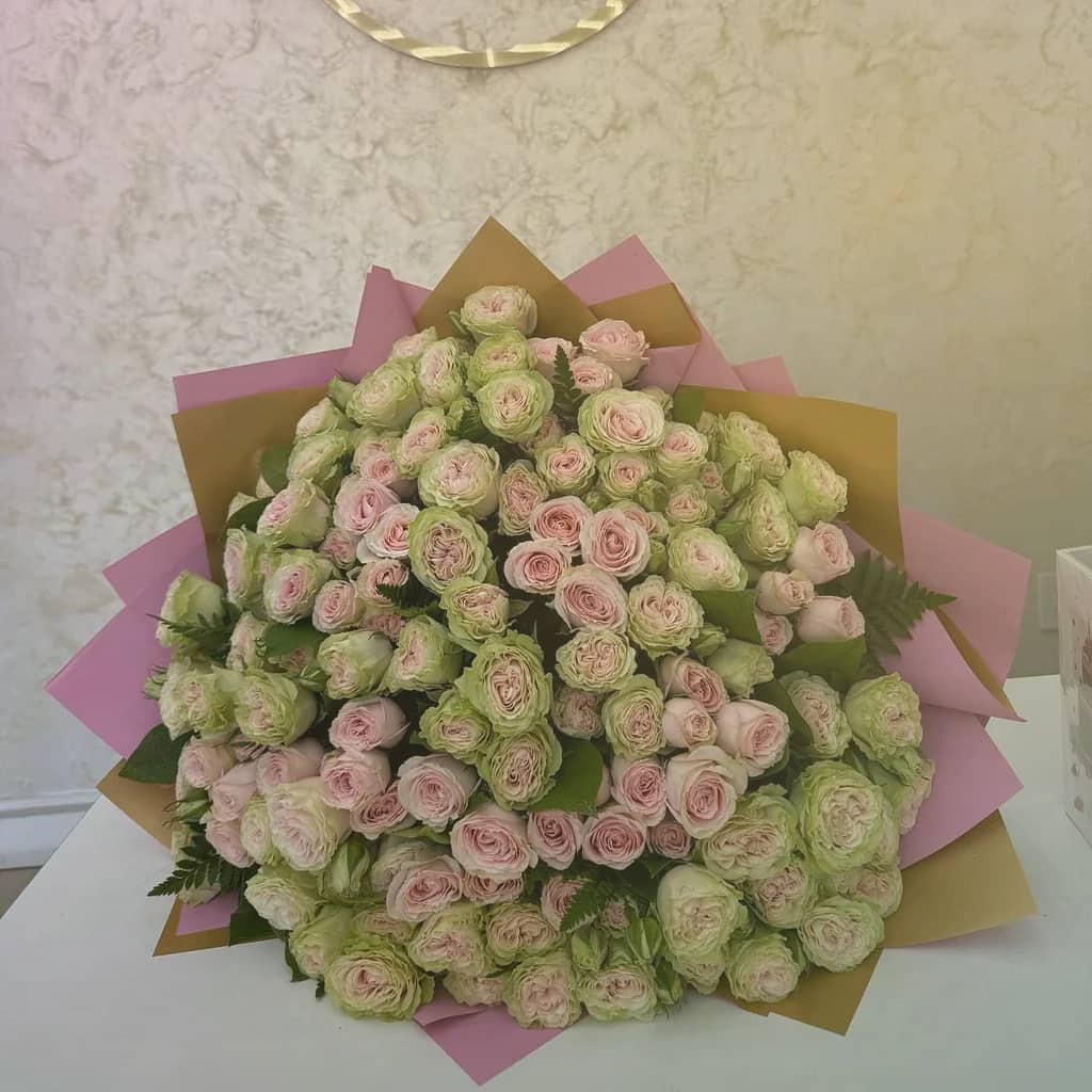 April Fools' Day flowers preview with parrot tulips, striped tulips, and ranunculus in tulip pink, sunny yellow, and spring green tones from Lina Flowers