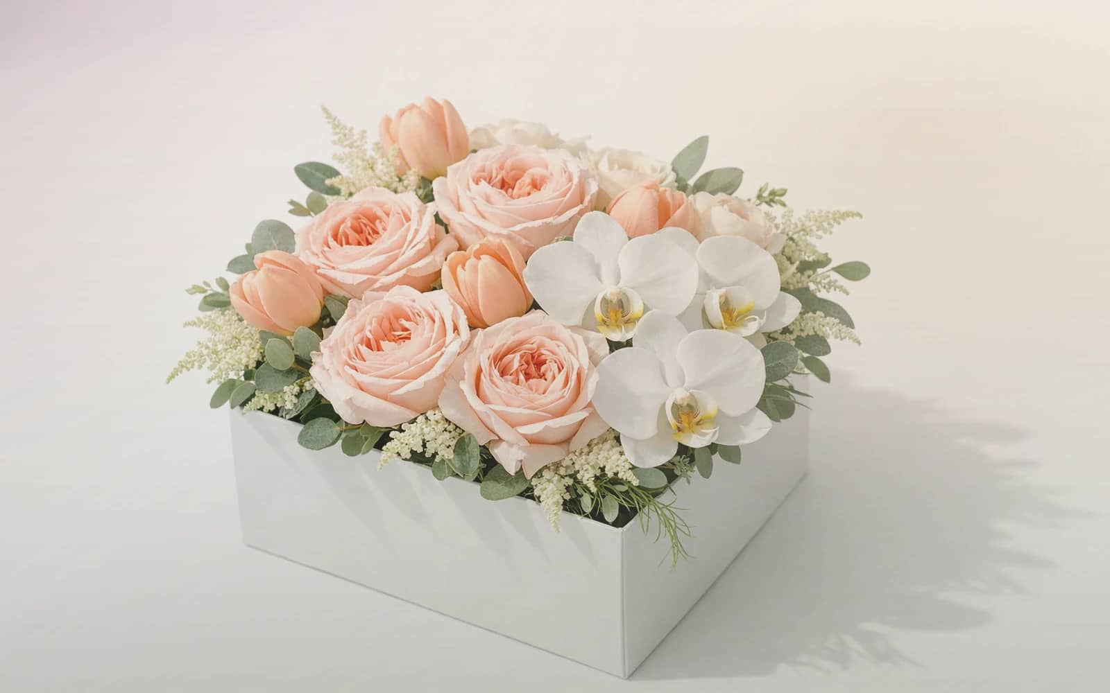 Boss's Day flowers with burgundy garden roses, warm tan ranunculus, and cream tulips, burgundy, warm tan, and soft cream color direction, and premium refined, sincere, professional, and quietly grateful styling from Lina Flowers