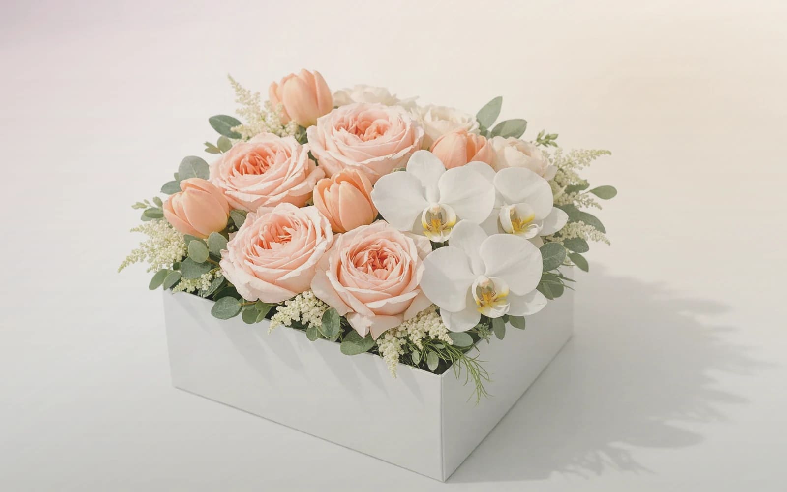 Boss's Day flowers with burgundy garden roses, warm tan ranunculus, and cream tulips, burgundy, warm tan, and soft cream color direction, and premium refined, sincere, professional, and quietly grateful styling from Lina Flowers