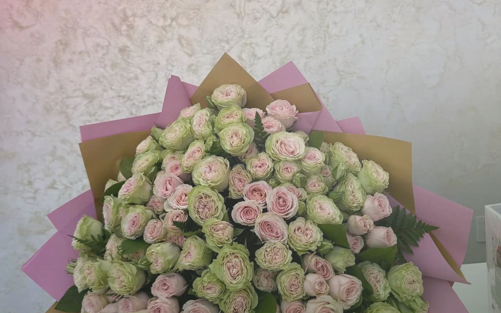 Canada Day flowers with red garden roses, white tulips, and spray roses, maple red, soft white, and garden green color direction, and premium proud, clean, warm, and quietly summer-celebratory styling from Lina Flowers