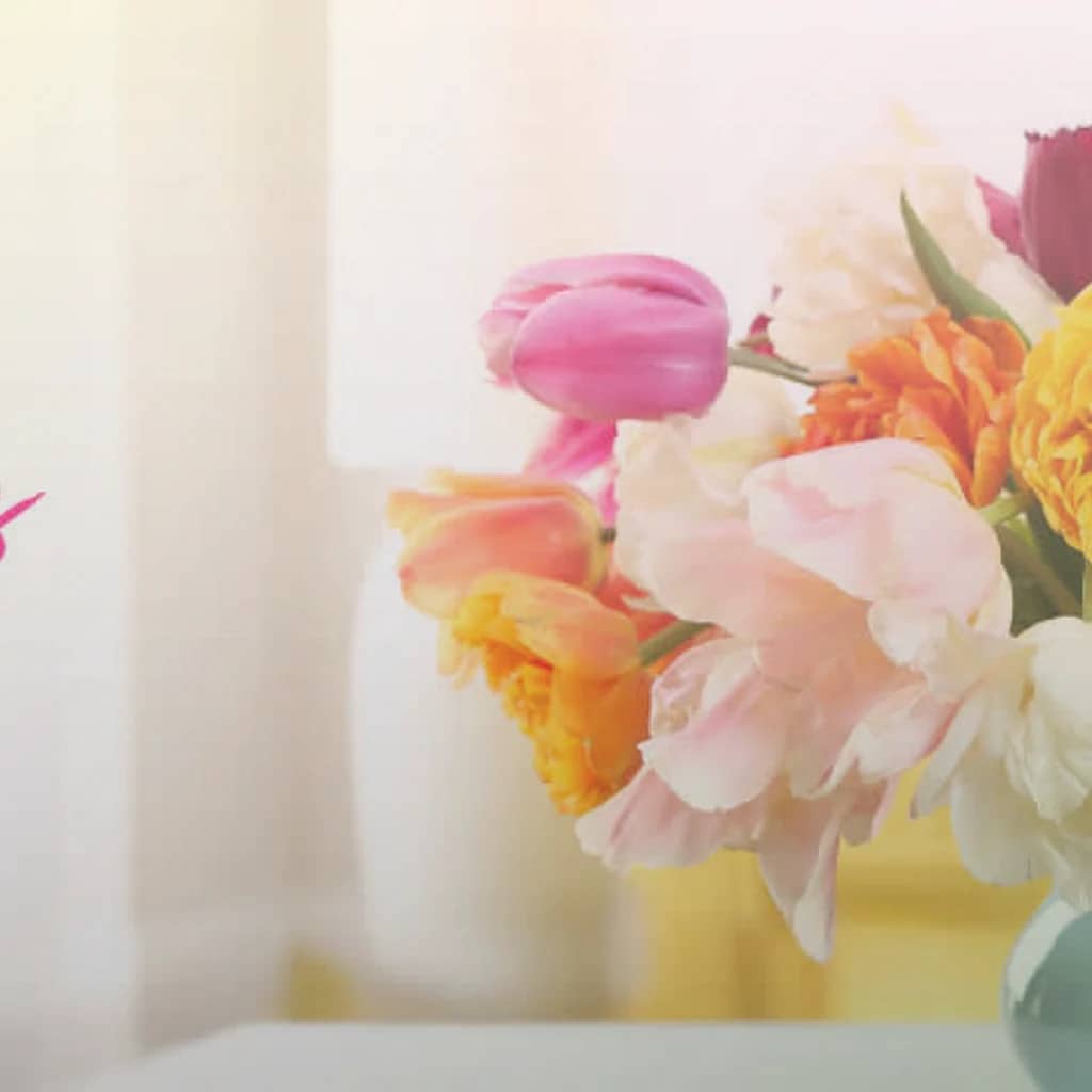Daylight Saving Spring Forward flowers preview with tulips, ranunculus, and spray roses in soft lemon, pale pink, and fresh green tones from Lina Flowers