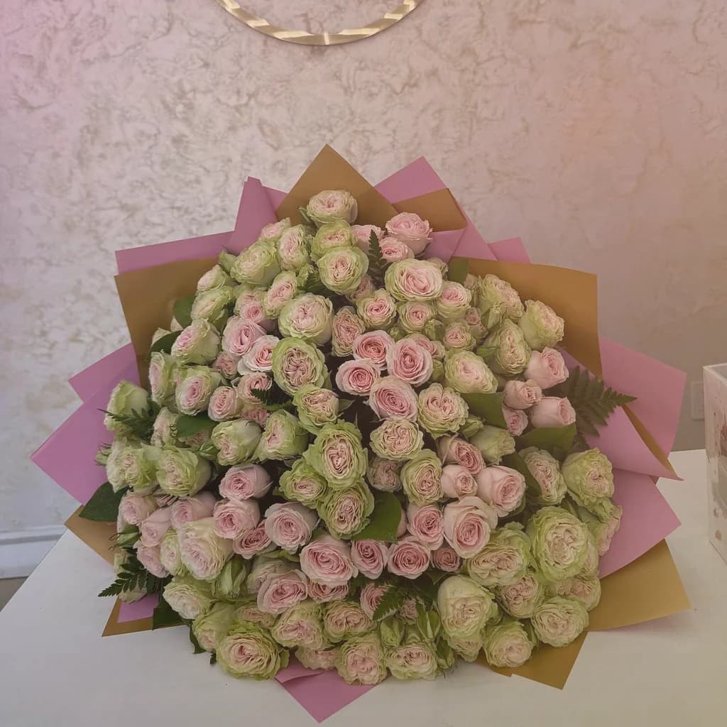 National Friendship Day flowers preview with pink garden roses, coral ranunculus, and sunny tulips in bright pink, coral, and sunny yellow tones from Lina Flowers