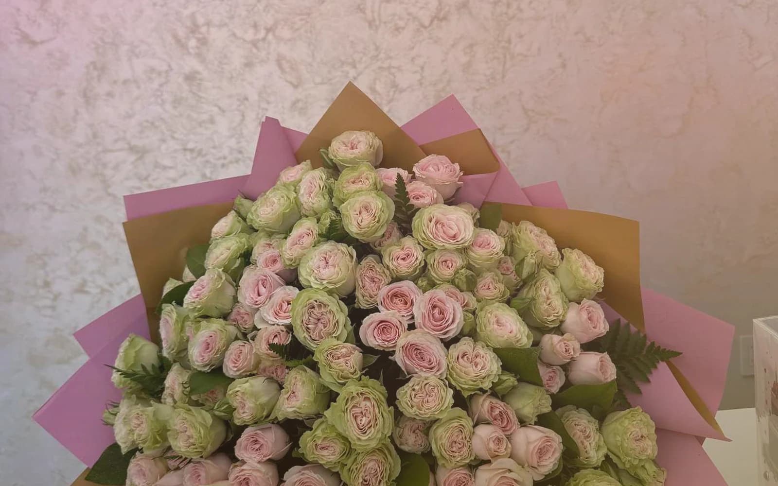 National Friendship Day flowers with pink garden roses, coral ranunculus, and sunny tulips, bright pink, coral, and sunny yellow color direction, and premium cheerful, generous, warmly summer, and friendship-led styling from Lina Flowers