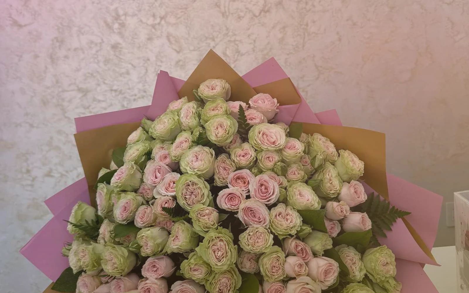 National Friendship Day flowers with pink garden roses, coral ranunculus, and sunny tulips, bright pink, coral, and sunny yellow color direction, and premium cheerful, generous, warmly summer, and friendship-led styling from Lina Flowers