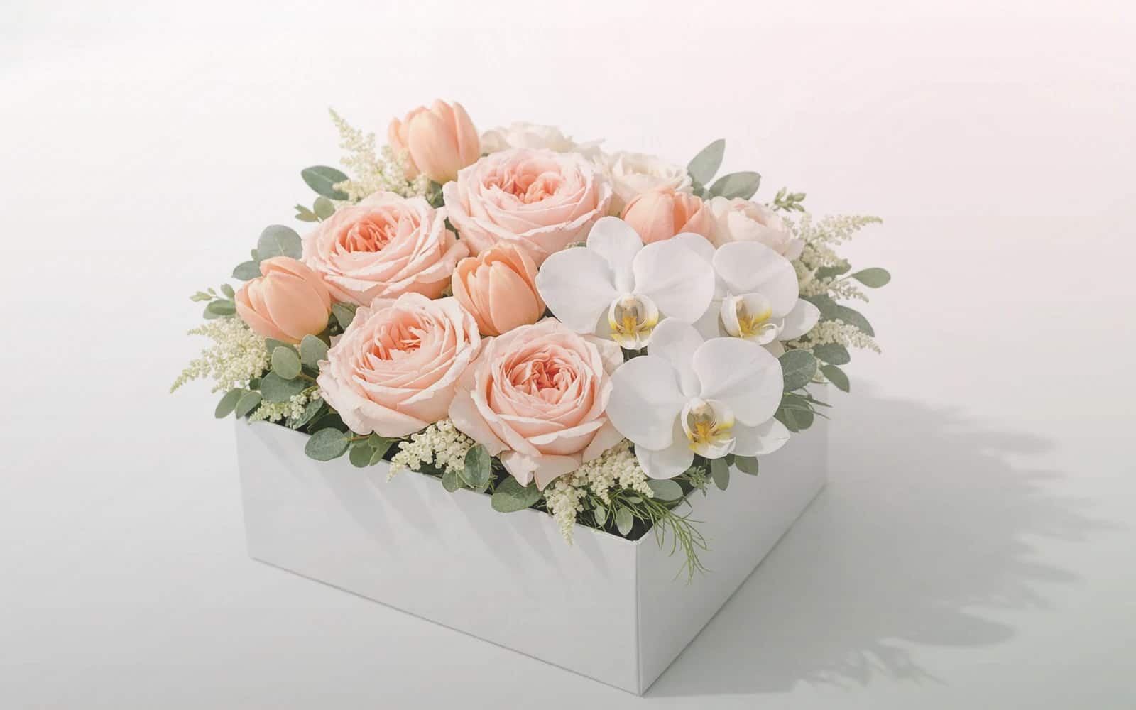 Nurses Day flowers with white roses, blush tulips, and ranunculus, soft white, blush, and seeded sage color direction, and premium calm, restorative, sincere, and quietly thankful styling from Lina Flowers
