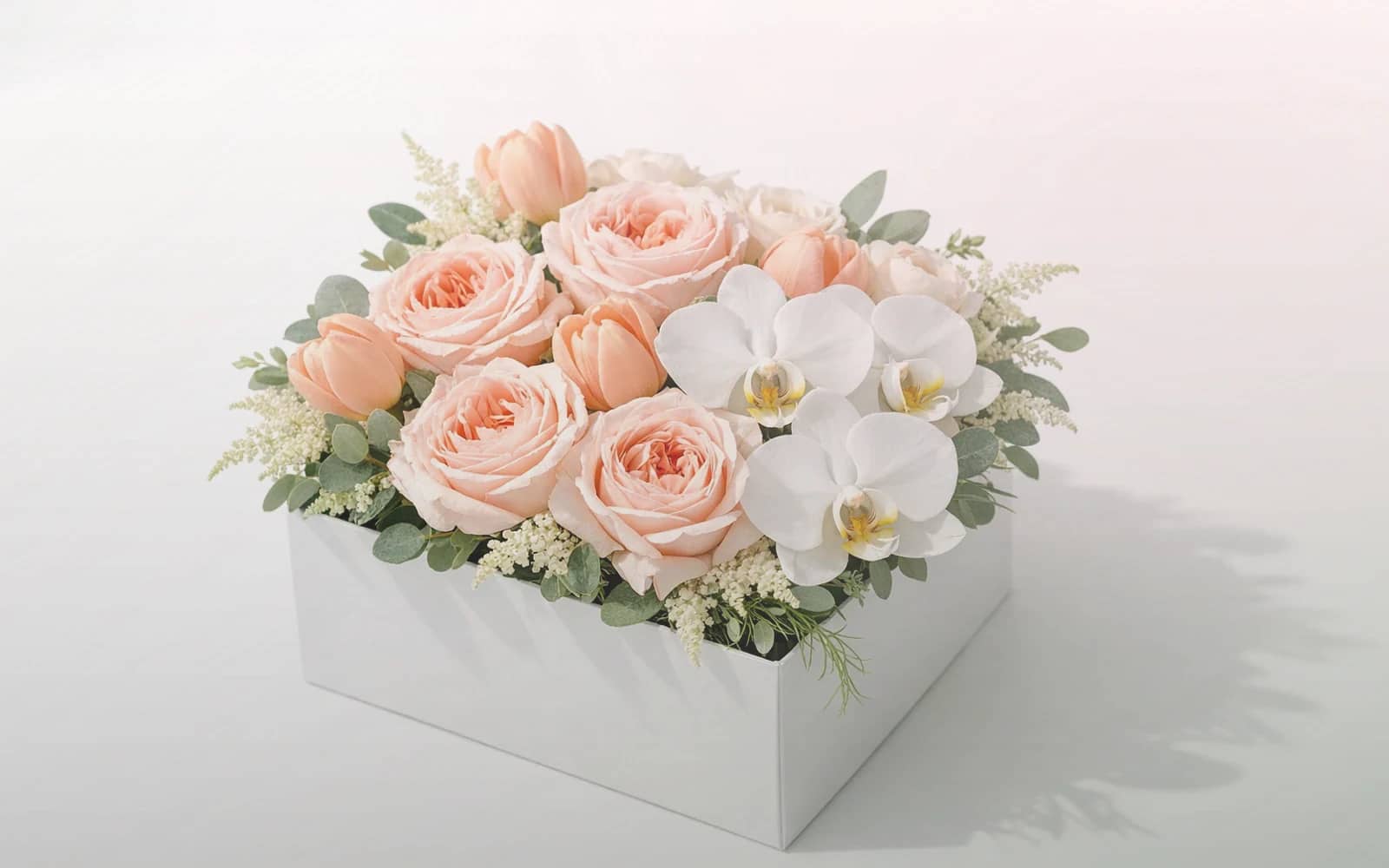 Nurses Day flowers with white roses, blush tulips, and ranunculus, soft white, blush, and seeded sage color direction, and premium calm, restorative, sincere, and quietly thankful styling from Lina Flowers