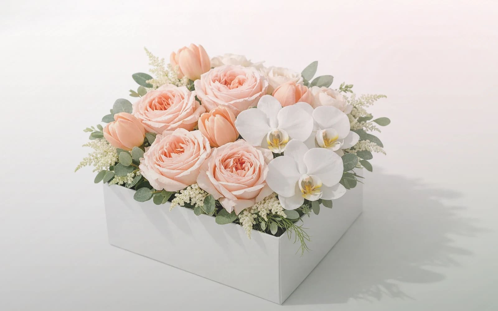 Nurses Day flowers with white roses, blush tulips, and ranunculus, soft white, blush, and seeded sage color direction, and premium calm, restorative, sincere, and quietly thankful styling from Lina Flowers