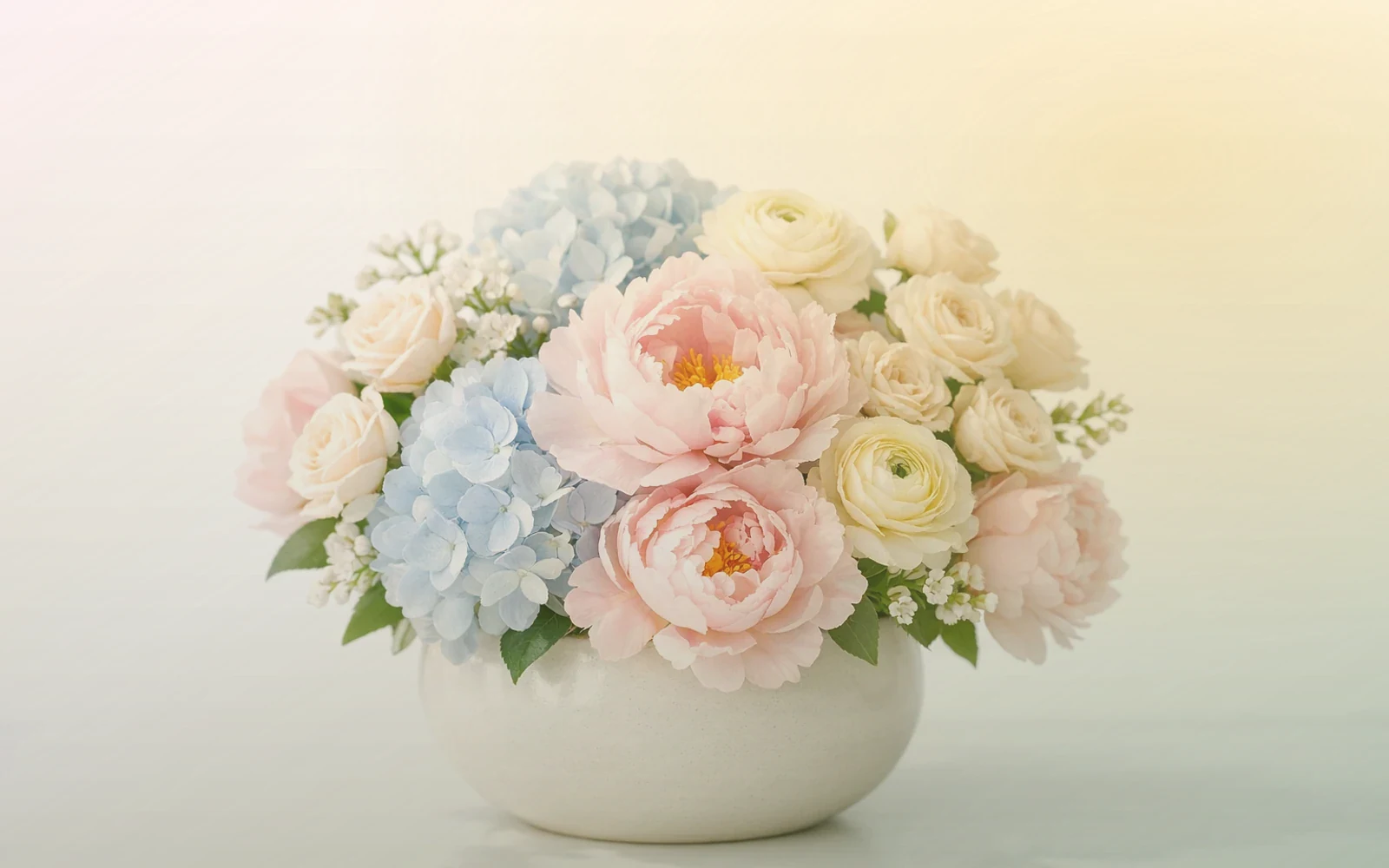 Teacher Appreciation Week flowers with pink ranunculus, tulips, and sunflowers, soft pink, sunny yellow, and fresh green color direction, and premium sincere, bright, approachable, and warmly thankful styling from Lina Flowers