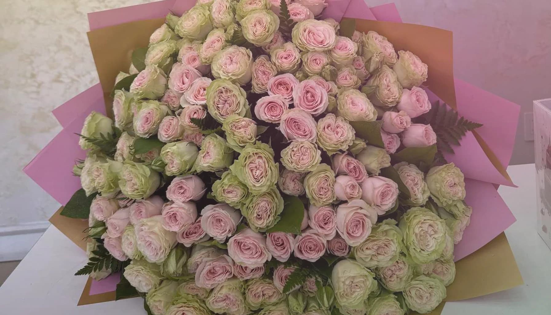 World Emoji Day flowers collection banner with sunflowers, yellow tulips, and hot-pink ranunculus and cheerful, playful, sunny, and feel-good styling from LiNa Garden