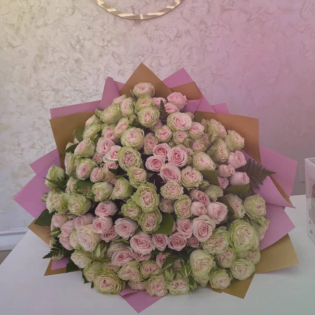 World Emoji Day flowers preview with sunflowers, yellow tulips, and hot-pink ranunculus in sunny yellow, hot pink, and spring green tones from Lina Flowers