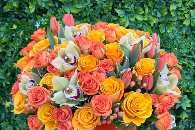 The Atelier Mix luxury rose, tulip, and orchid flower box from Lina Flowers in Van Nuys