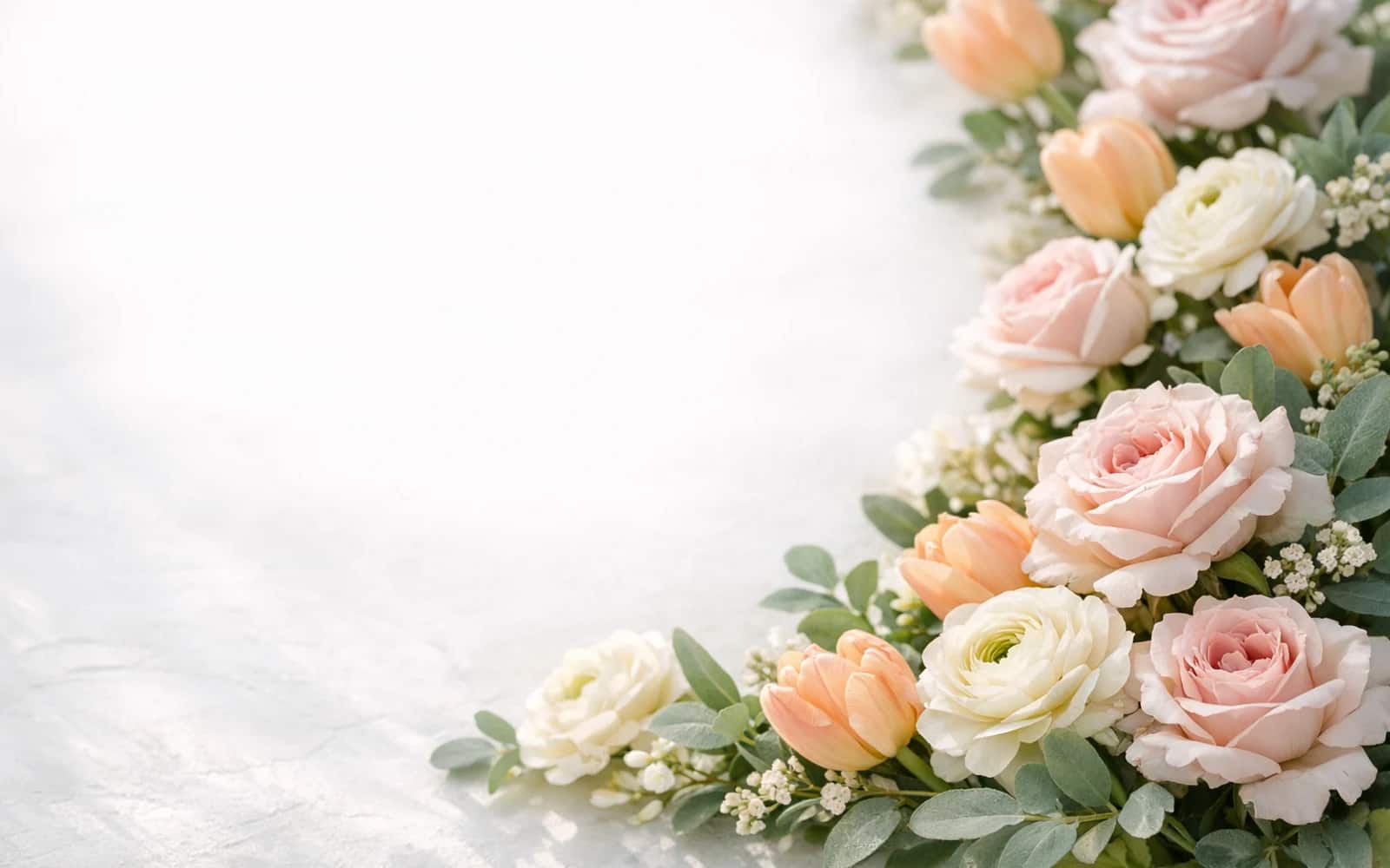 Soft floral backdrop with pale roses and fresh greenery