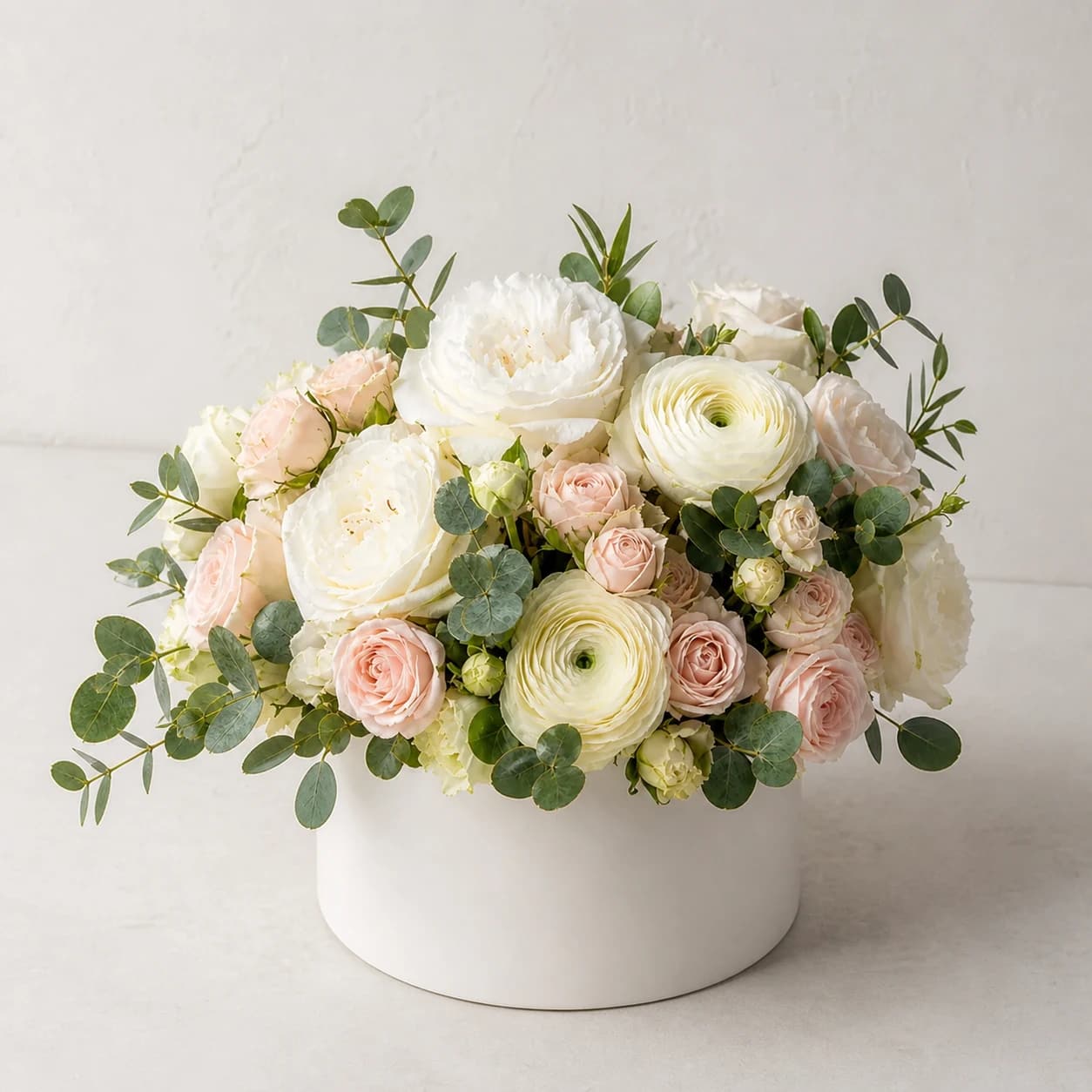 Ivory House AI-assisted studio view of the modern flower box in ivory, cream, whisper blush, and muted sage